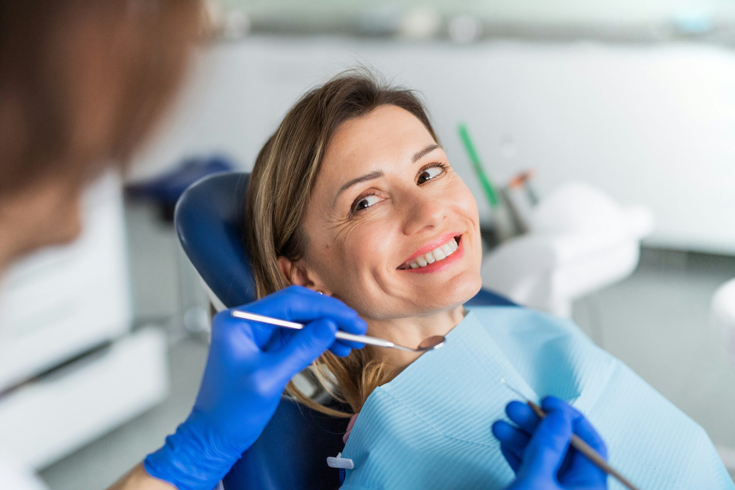 Dental practice, a patient with a happy smile